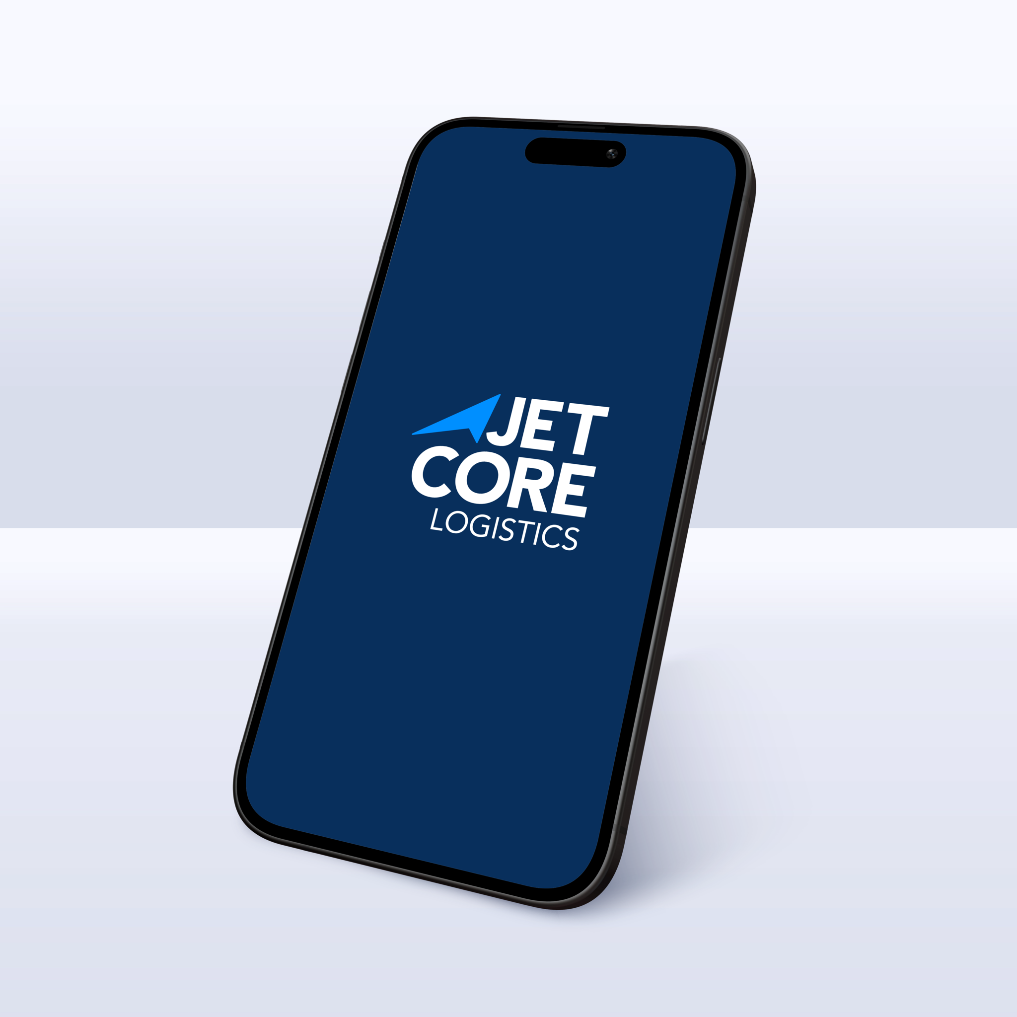 Concept application mockup: a smartphone standing on a light surface showing a navy splash screen with the Jetcore Logistics lockup.