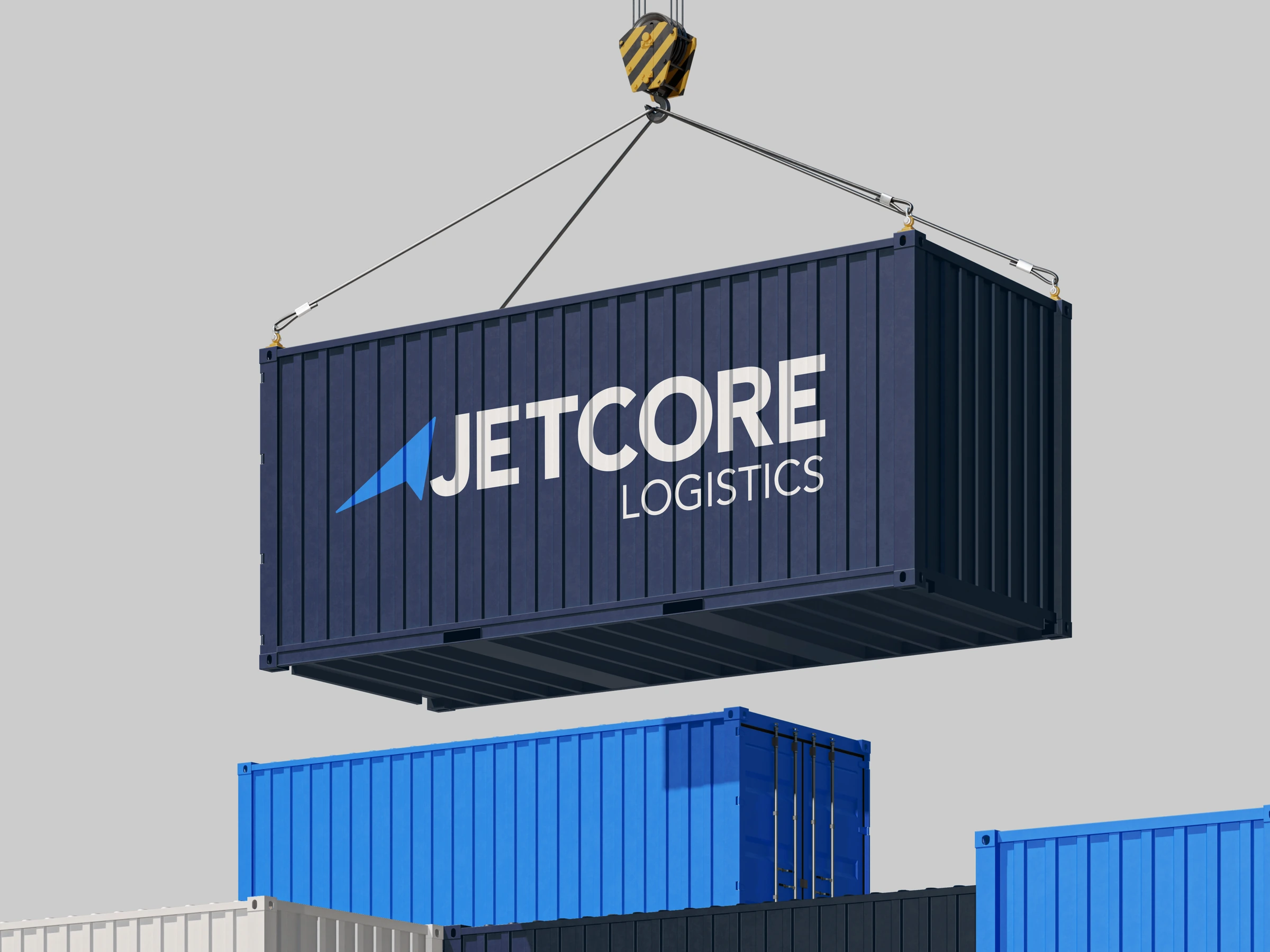 Conceptual application mockup: an isometric navy shipping container suspended from a crane above blue containers, with the white Jetcore Logistics wordmark and blue directional symbol.